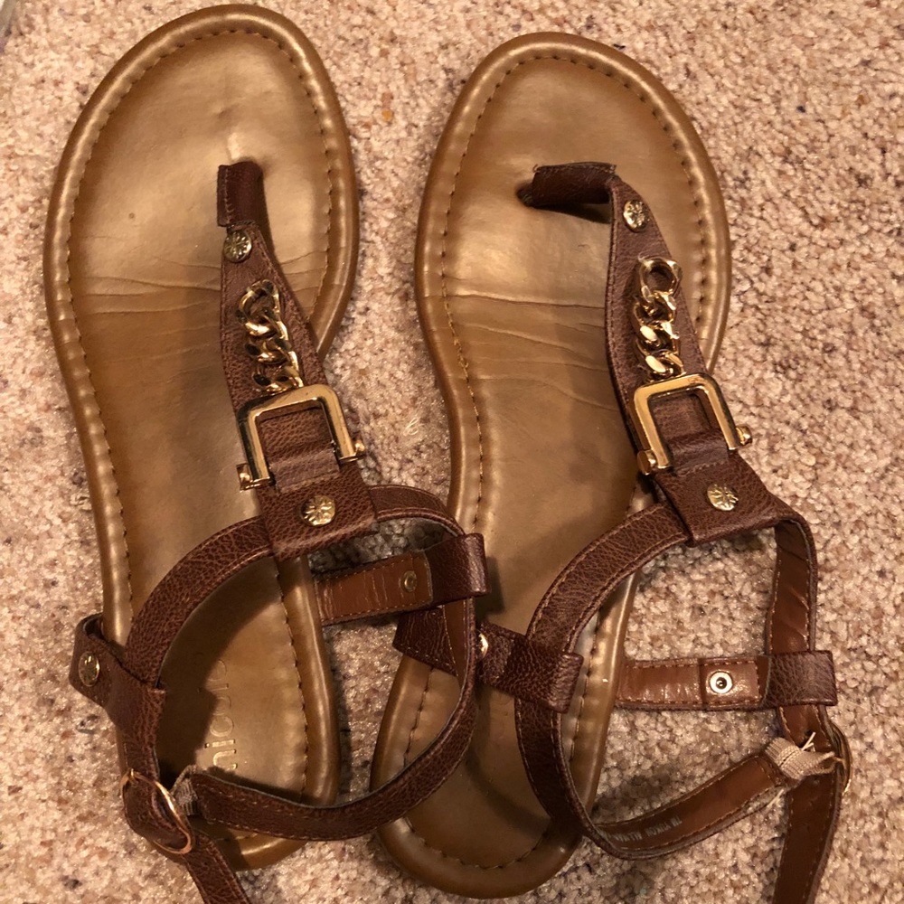 New, slightly used brown sandals with gold buckle